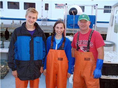 Student interns with lobsterman